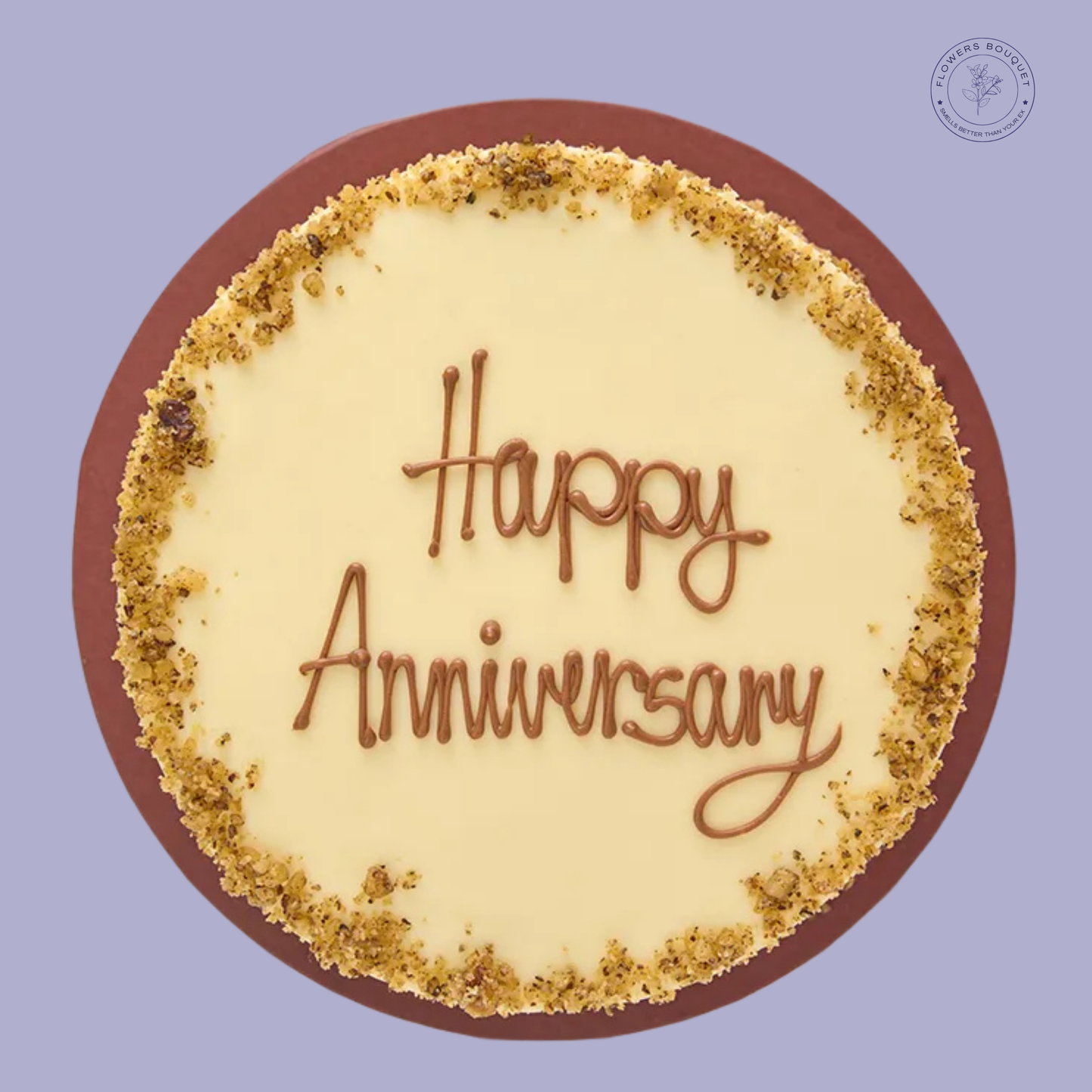Elegant vanilla anniversary cake with a 'Happy Anniversary' message and nut garnish, ideal for special celebrations.