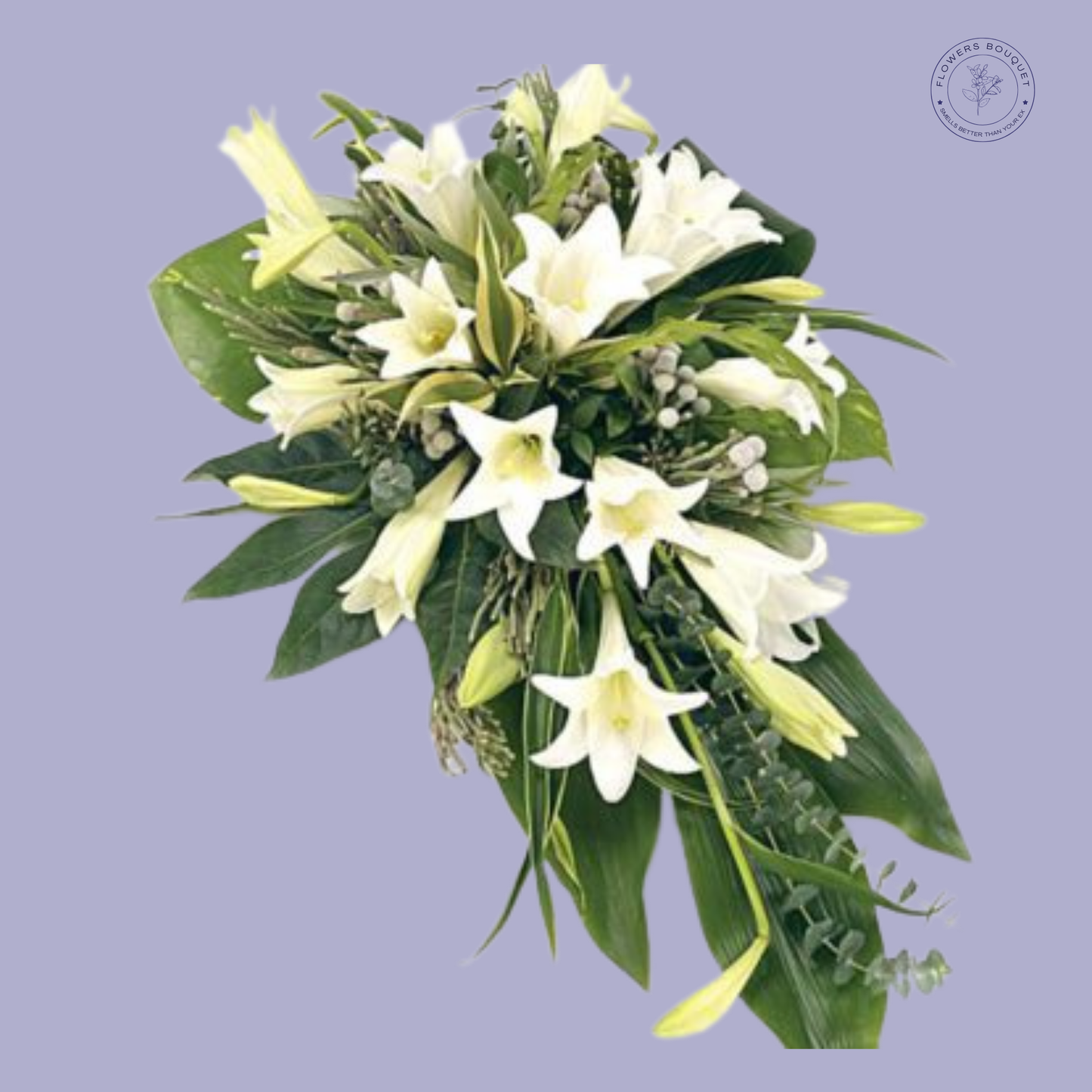 Elegant white lily funeral bouquet with lush greenery and delicate foliage.