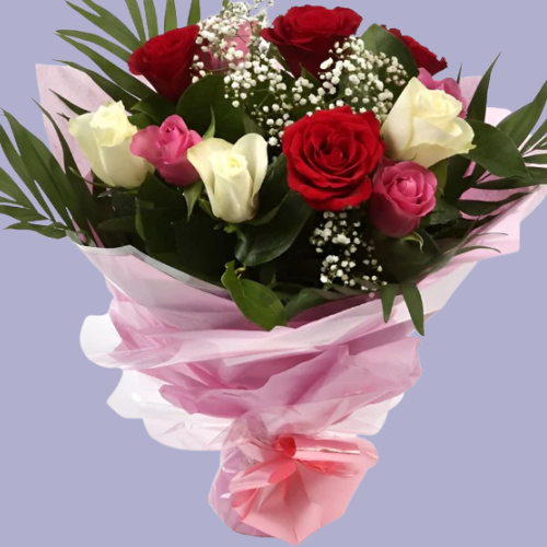 “Romantic bouquet with red, white, and pink roses mixed with baby’s breath and greenery, wrapped in pink paper – UK flower gift.”