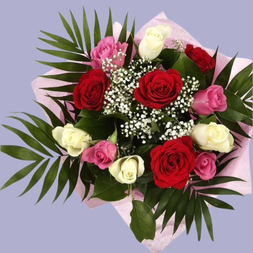 “Romantic bouquet with red, white, and pink roses mixed with baby’s breath and greenery, wrapped in pink paper – UK flower gift.”