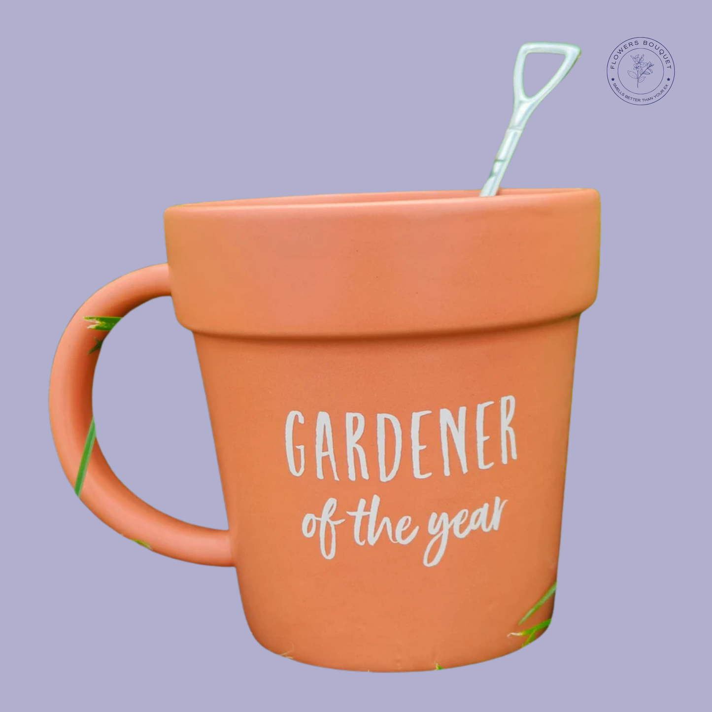 Terracotta-style ceramic mug with 'Gardener of the Year' text and a shovel-shaped spoon.