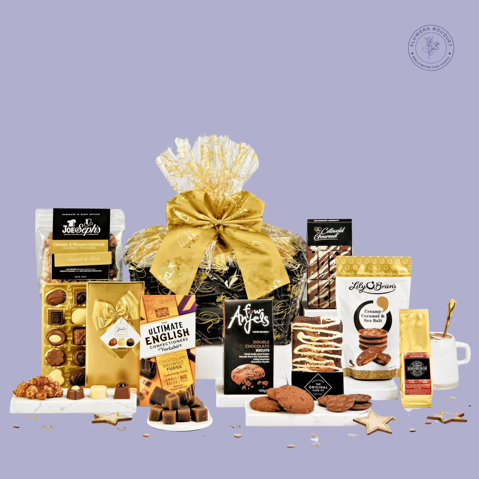 A luxurious chocolate gift hamper featuring gourmet popcorn, double chocolate biscuits, creamy caramel chocolates, chocolate fudge, truffles, and caramel latte sachets, elegantly wrapped with a golden bow.

