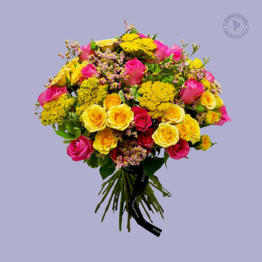 Bright and colorful bouquet with pink, yellow roses, and yellow yarrow, tied with a satin ribbon.