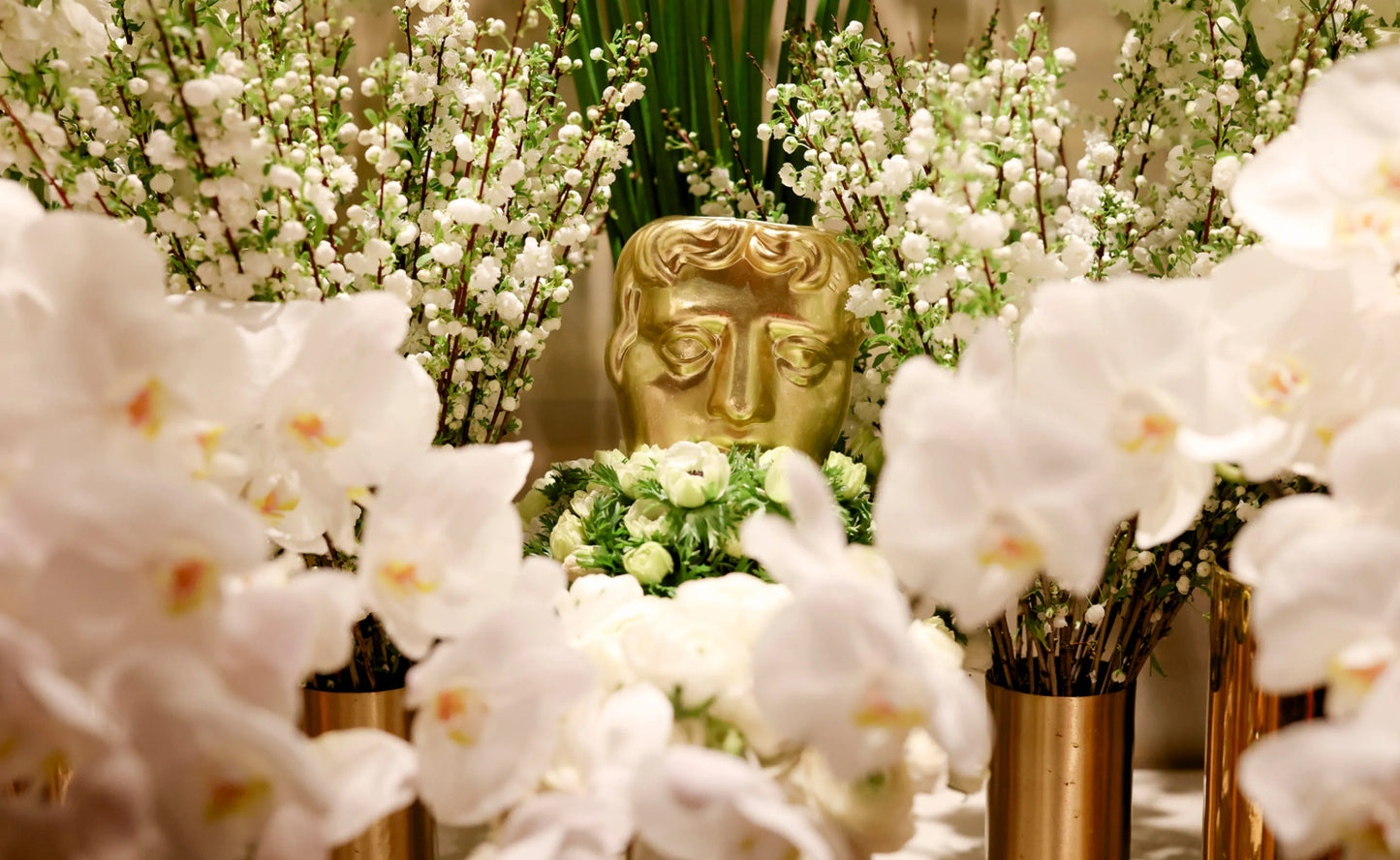 White Orchid and Blossoms arrangement in a gold vase, perfect for luxury events and award ceremonies.