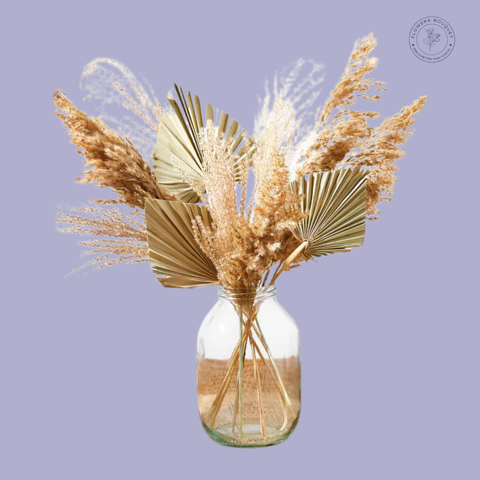 Golden Oasis Arrangement with dried pampas grass, preserved palm leaves, and golden reeds in a clear glass vase.