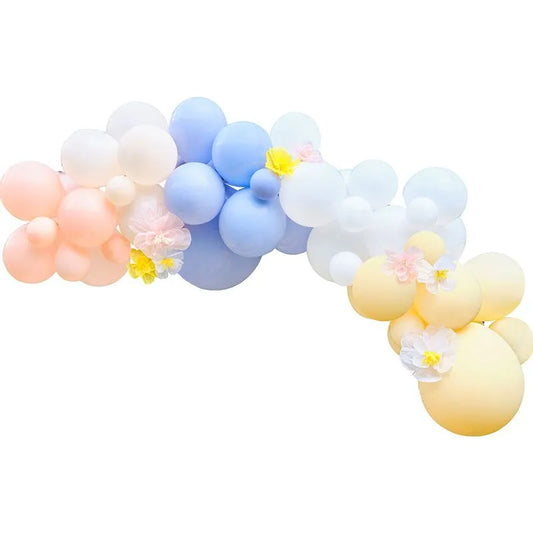 Pastel Blossom Balloon Arch with pastel balloons and flower accents, ideal for outdoor garden parties, weddings, and baby showers.
