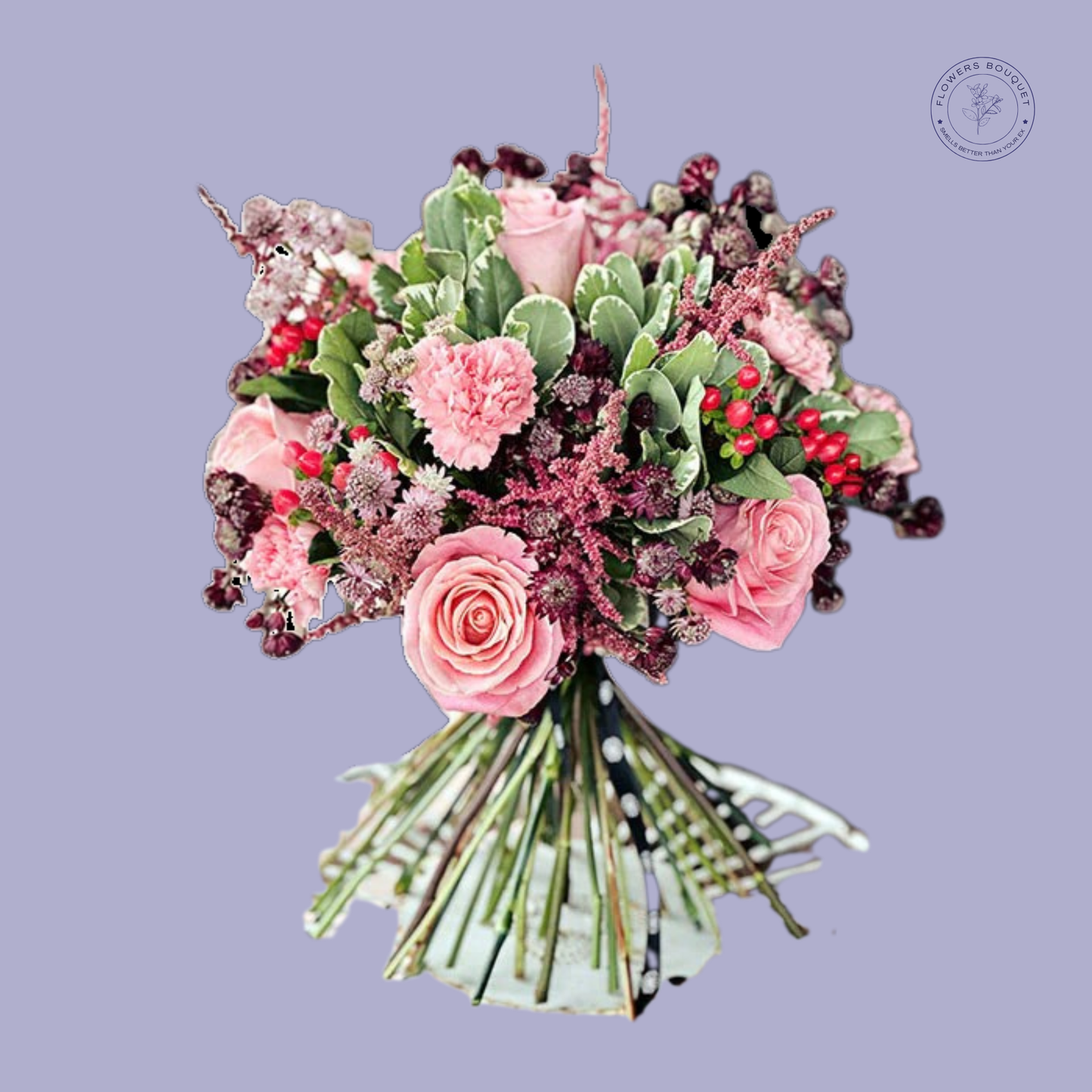 Romantic bouquet of pink roses, carnations, and berries in a glass vase with a polka dot ribbon.